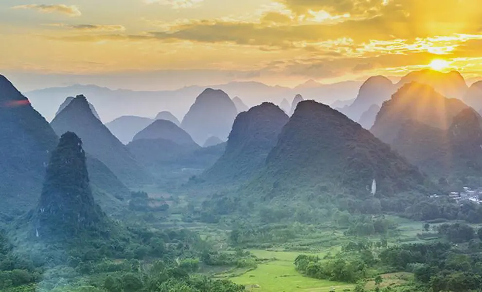 Sun shining over the hills of Guilin, China
