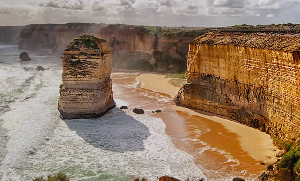 Waves crashing against the shore and cliffs